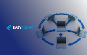 Six laptops put on a desk in a circle with the EasyDMARC logo in the left side