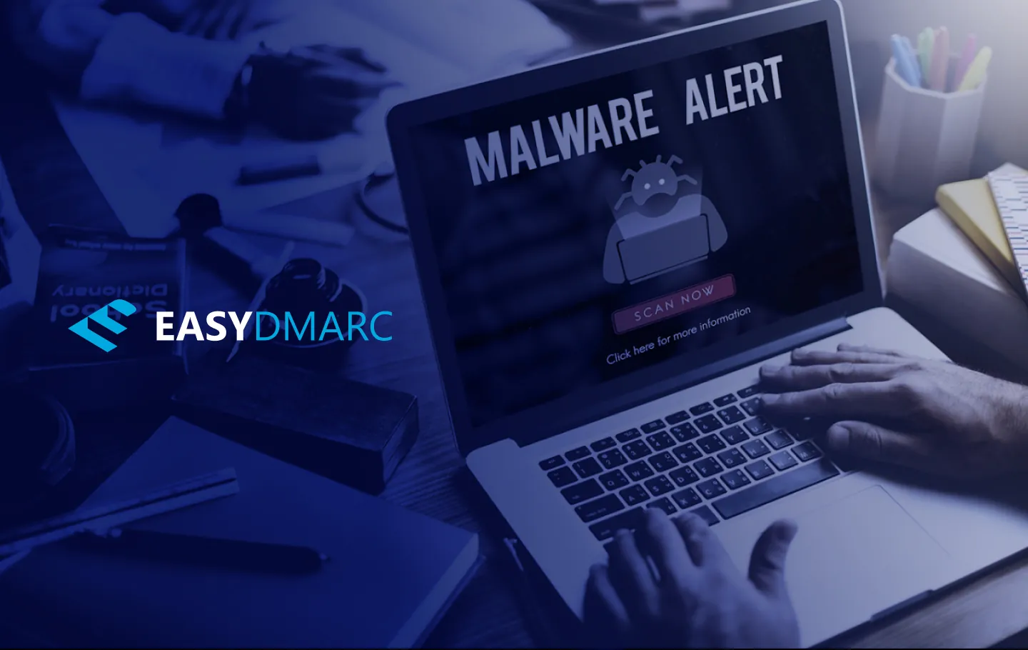 "Malware Alert" written on a laptop screen, a person typing on it's keyboard, EasyDMARC logo on the left side